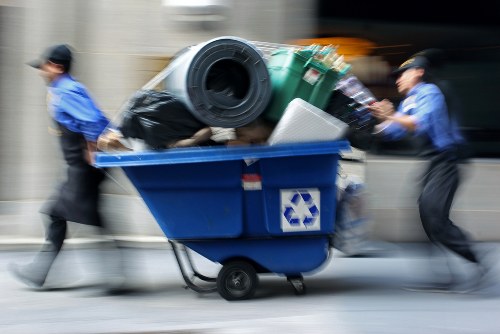 Heavy items being removed during garage clearance